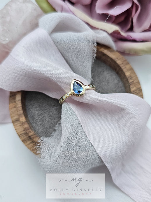 Sapphire and diamond yellow gold ring