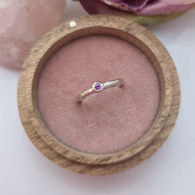 Silver stacking pebble ring. Purple sapphire. Textured band size S