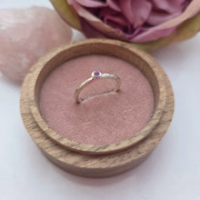 Silver stacking pebble ring. Purple sapphire. Textured band size S