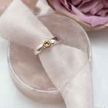Citrine with 9ct yellow gold setting and silver band