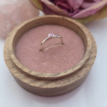 Silver stacking pebble ring with pink sapphire. Hammer finish. Size K