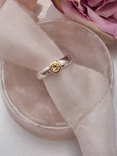 Citrine with 9ct yellow gold setting and silver band