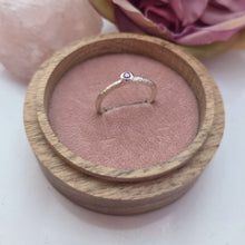 Silver stacking pebble ring. Purple sapphire. Textured band size S