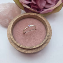 Silver stacking pebble ring. Purple sapphire. Textured band size S